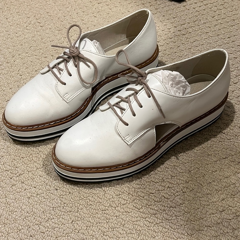 White mountain platform lace up with cutout on sides.